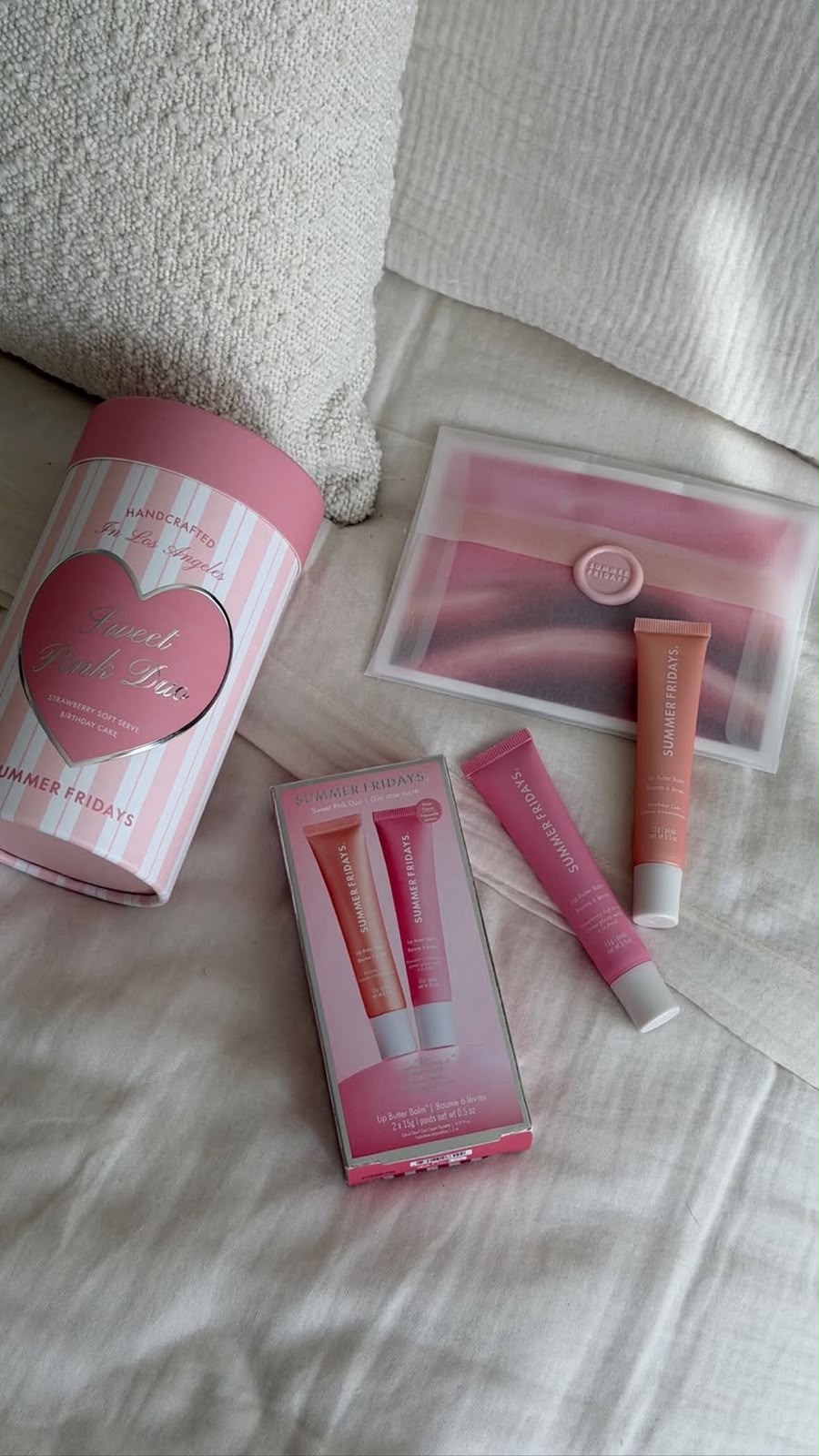 Pink bottles in warm Omani-inspired light