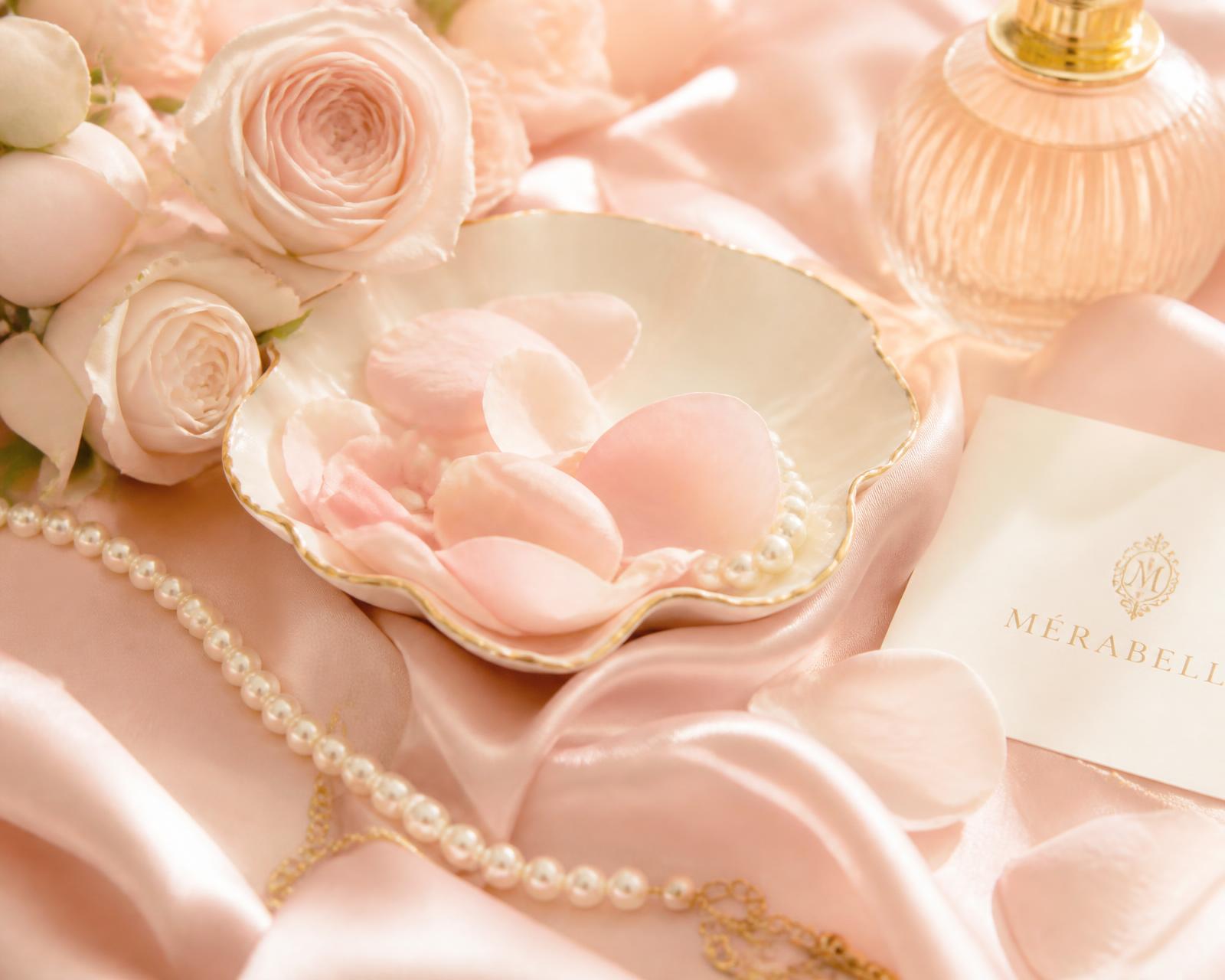 Rose petals, pearls and glassware